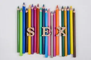 Word sex abstract letters, white background colored pencils