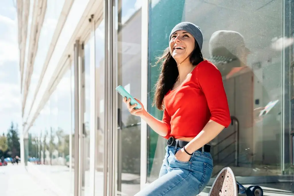 Young Happy Woman Using Phone
